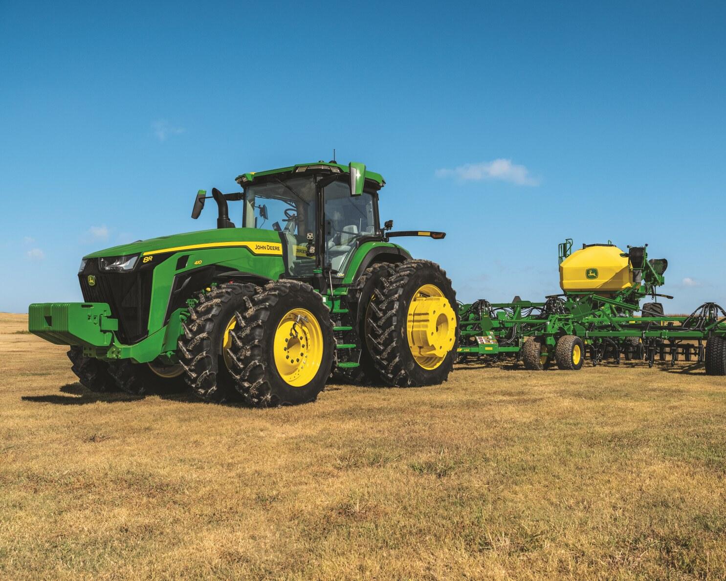 A John Deere 8R 410 tractor in a field in Tennessee.