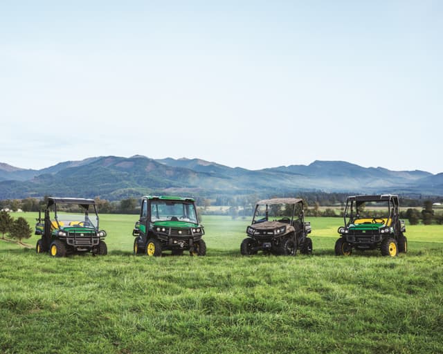 Gator UTVs A group shot of Gator UTVs, gas and diesel, in a pasture.